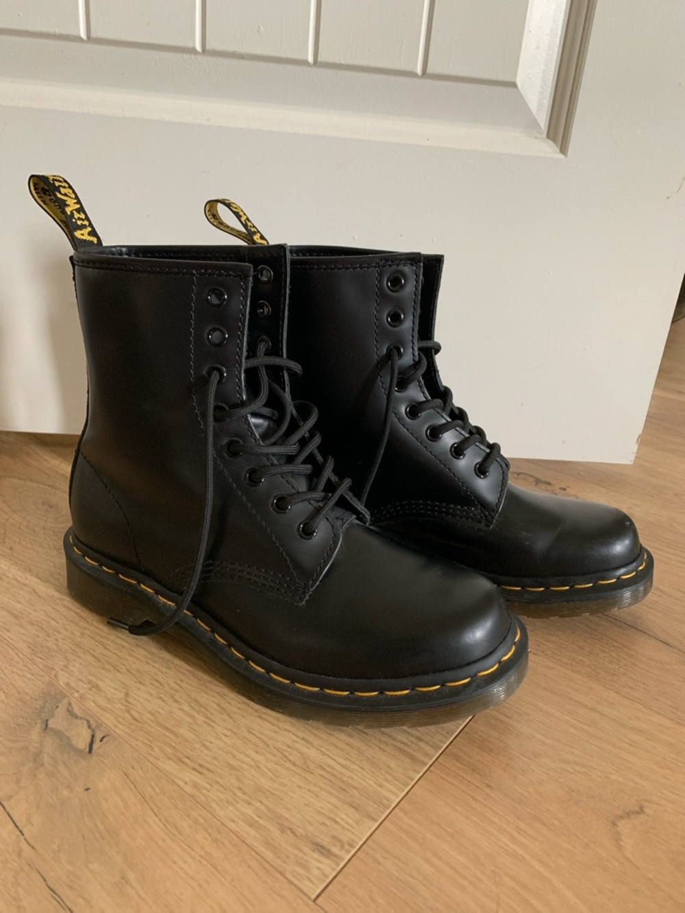 Dr. Martens Black Leather 8-Eye Boots with Yellow Stitching